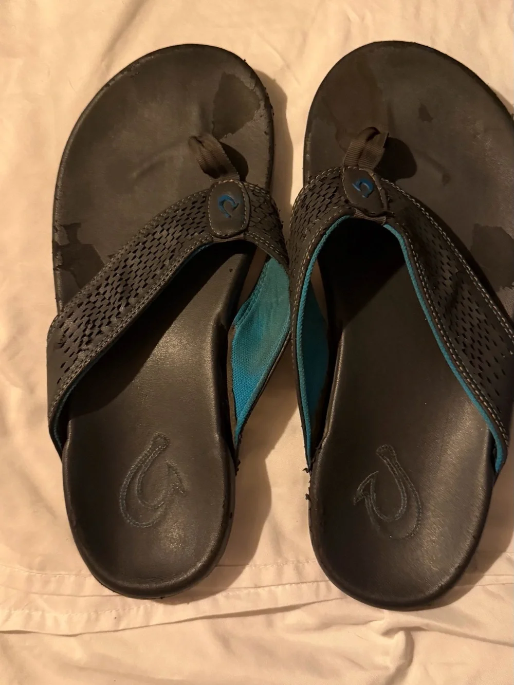 OluKai Men's Black Flip-Flops with Teal Accents